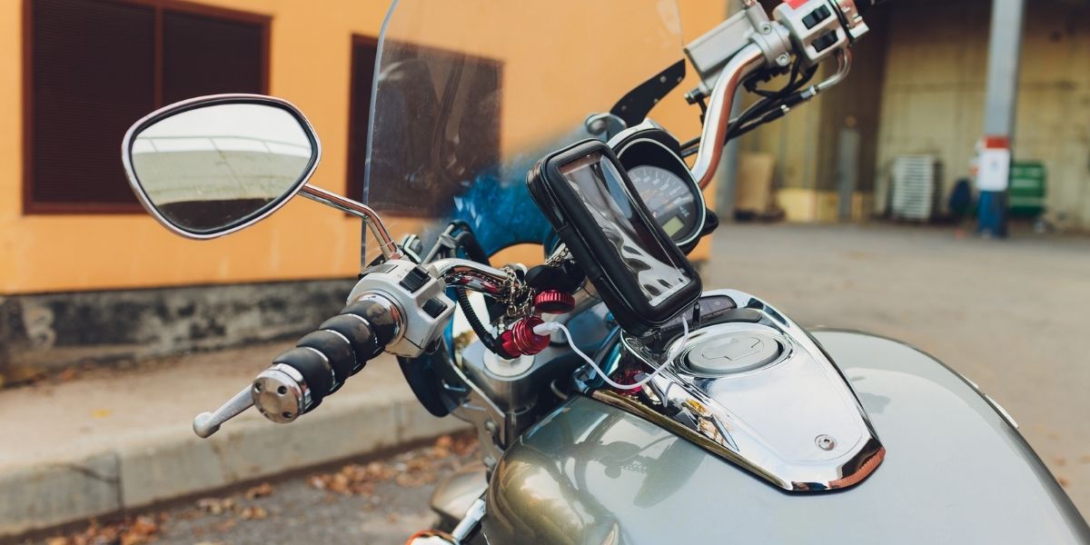 Power outlet for charger mobilephone on a modern motorcycle,Close up and selective focus