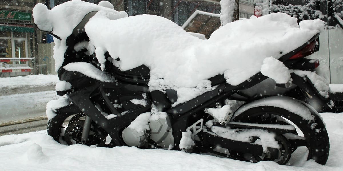 motorbike covered in snow