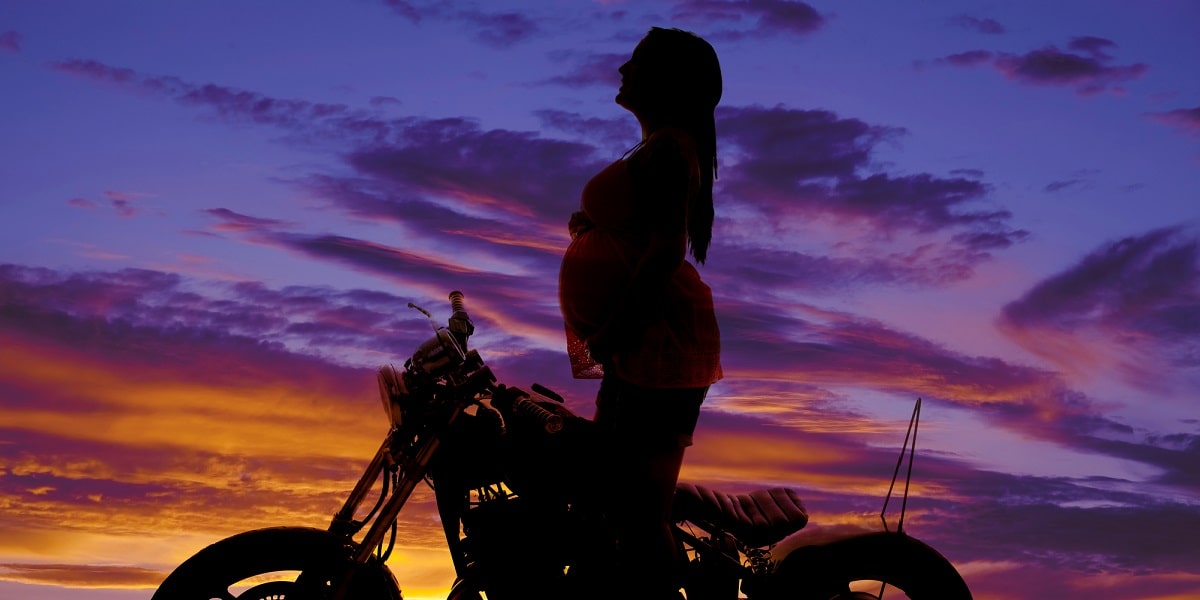 motorbike with pregnant rider